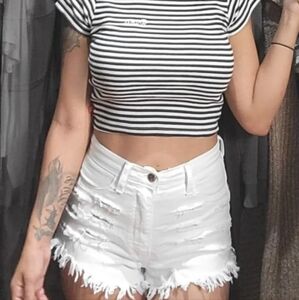 APHRODITE Distressed White Denim Cut Off Shorts.